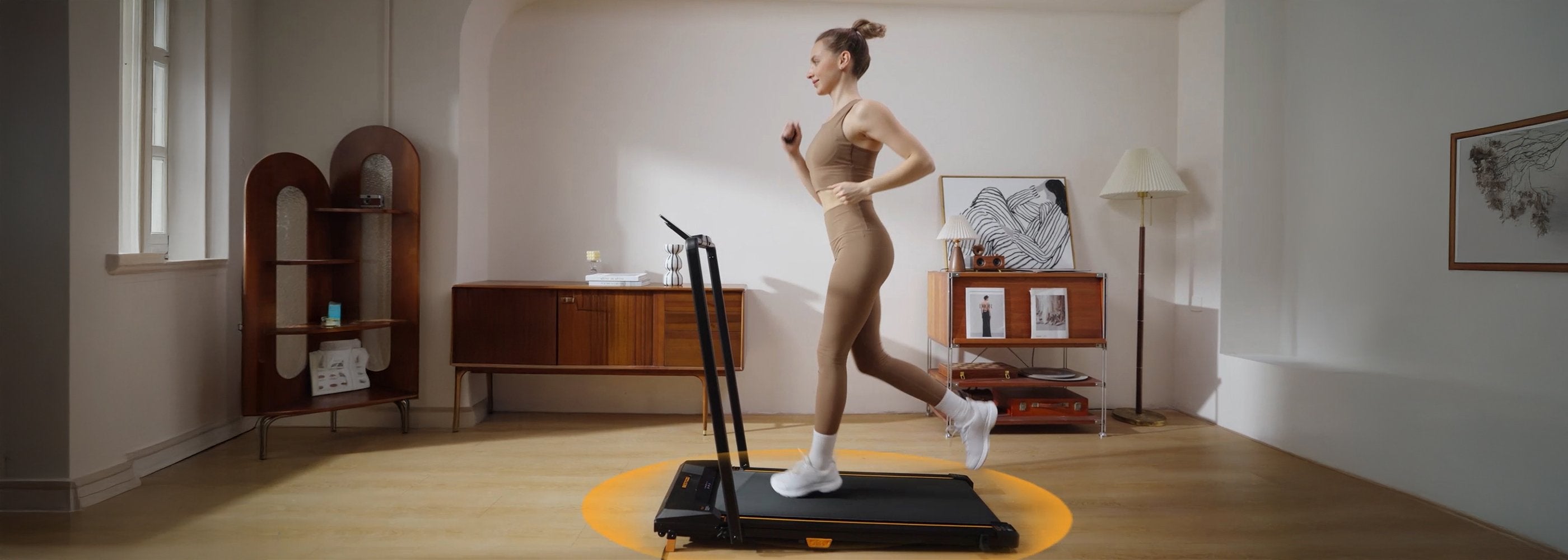 Model running on the BestGod T1 Pro Walking Pad, showcasing its sleek design in a horizontal layout